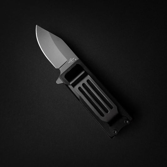 Guild Arms Black Spring Assisted Lighter Knife with sleek black handle and sharp stainless steel blade