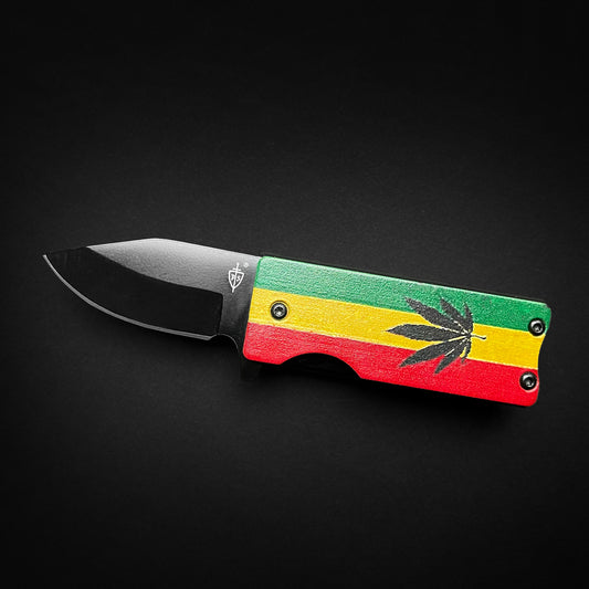 Guild Arms Lighter Case marijuana pocket knife with Rasta red yellow green handle and black drop point blade