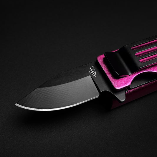 Guild Arms Lighter Knife Case Spring Assisted Pocket Knife Pink closeup of black blade and metallic pink handle with pocket clip