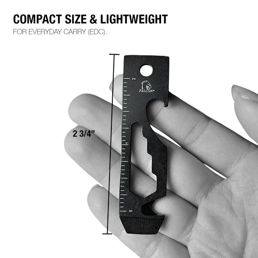 Falcon multi-tool keychain compact black EDC multitool with ruler markings bottle opener wrench held in hand