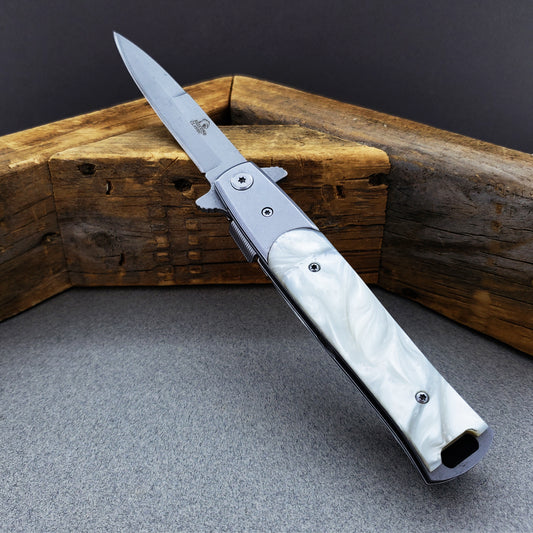 Falcon White Spring Assisted Pocket Knife with sleek design and stainless steel blade