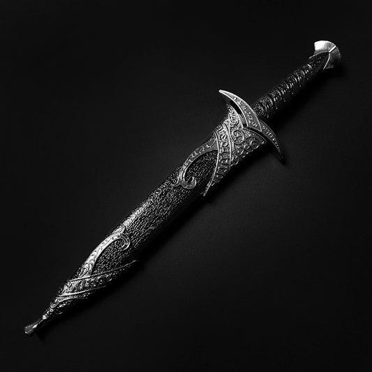 Guild Arms intricately designed silver fantasy dagger for sale with detailed engravings and textured handle