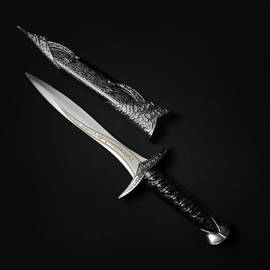 Guild Arms fantasy dagger for sale with engraved blade and ornate black and silver handle