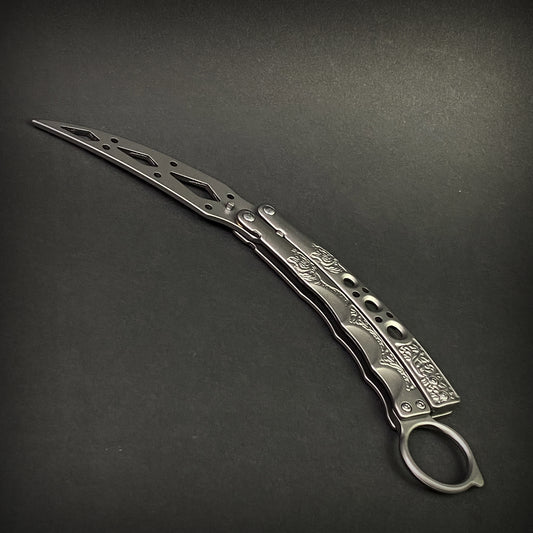 Guild Arms butterfly knife trainer for beginners with detailed cutout blade and engraved handles