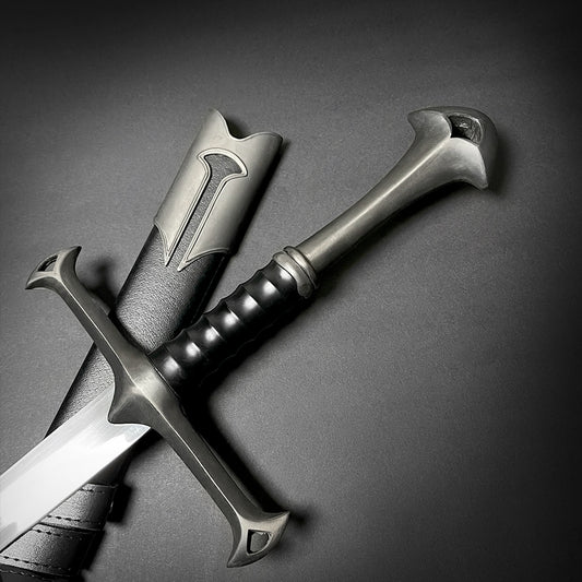 Guild Arms collectible medieval sword replica with detailed hilt and leather sheath on black background