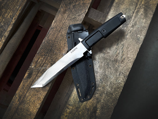 Buy outdoor hunting knives online precision blade with black handle and sheath on wooden surface