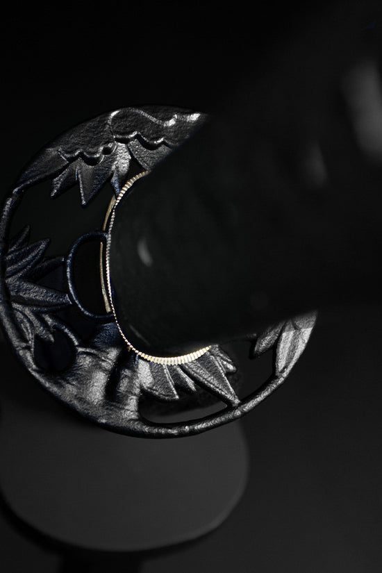 Katana tsuba handguard close-up- Guild Arms.