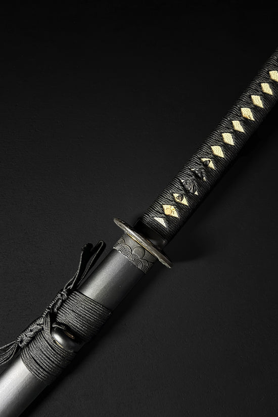 Black katana hilt with gold accents | Guild Arms