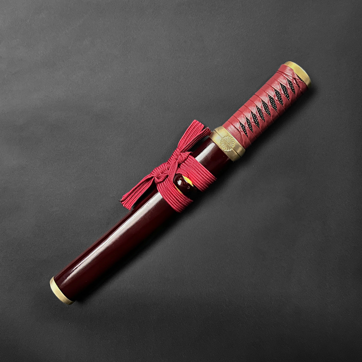 13.75" Hand forged tanto w/ burgundy wood scabbard.