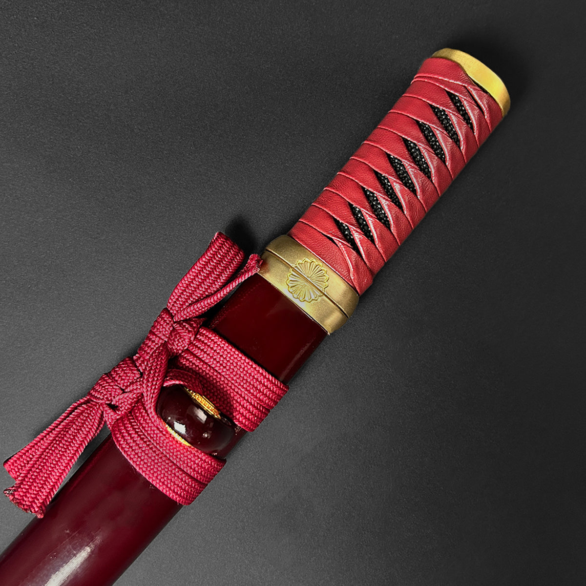 13.75" Hand forged tanto w/ burgundy wood scabbard.