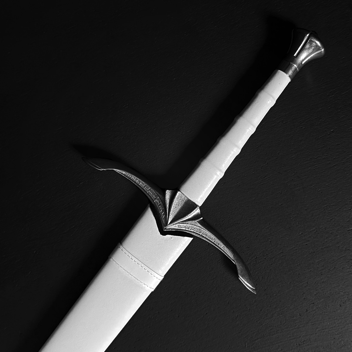 Medieval sword hilt in white scabbard | Guild Arms