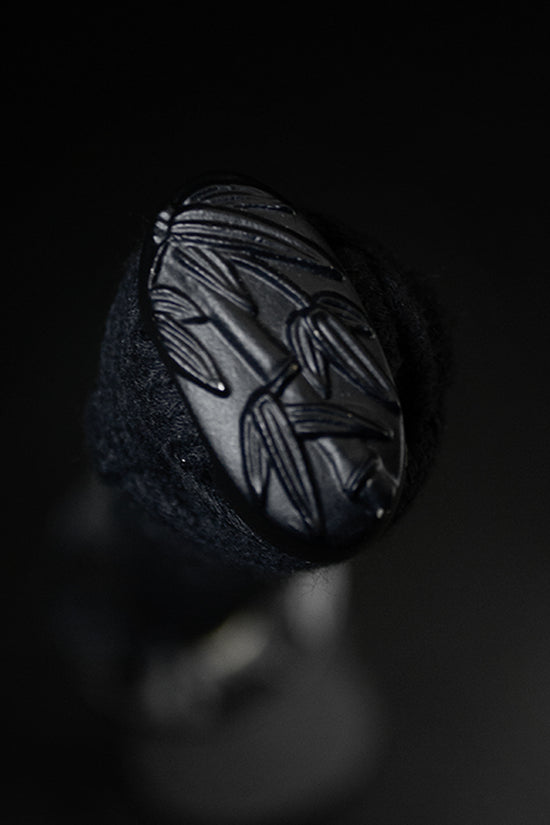 Carved bamboo kashira pommel cap- Guild Arms.