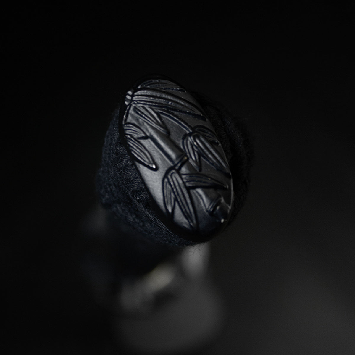 Carved bamboo kashira pommel cap- Guild Arms.