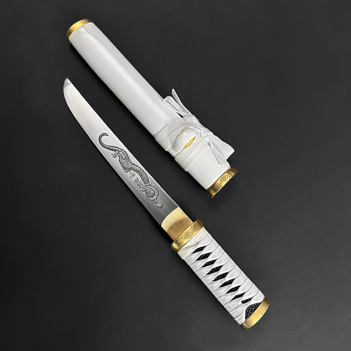 13.75" Hand forged tanto w/ white wood scabbard.