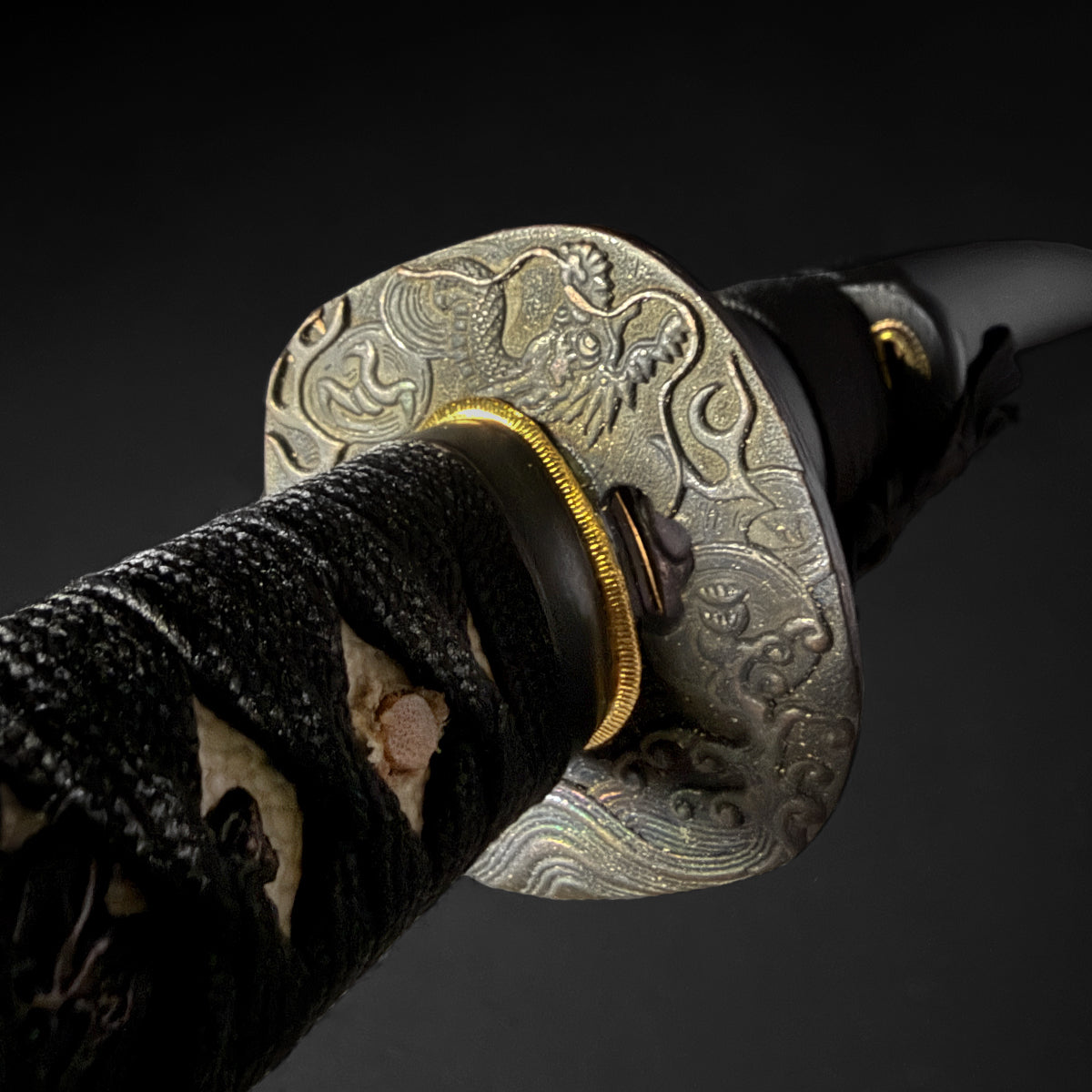 Katana guard and wrapped hilt close-up. | Guild Arms