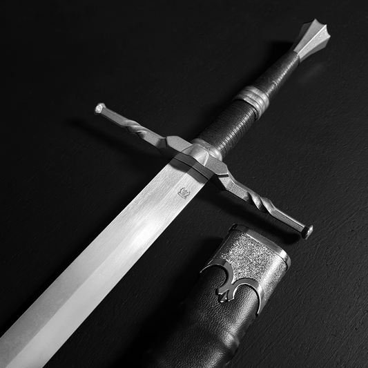 Medieval sword hilt next to scabbard | Guild Arms