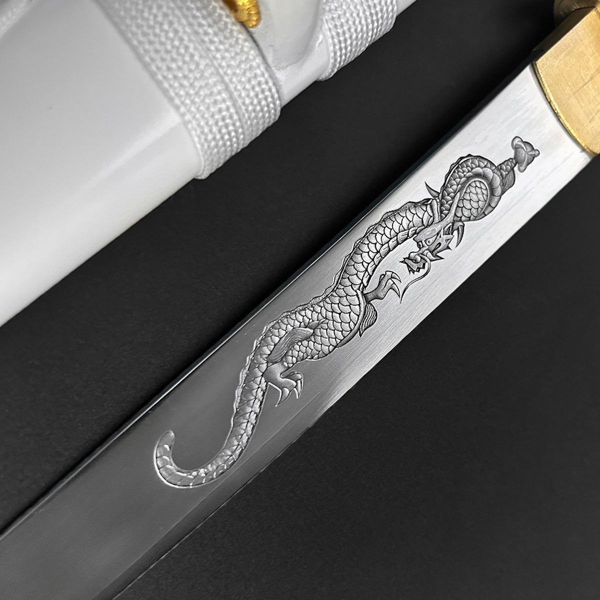 13.75" Hand forged tanto w/ white wood scabbard.