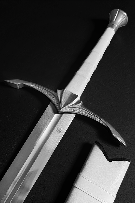 Medieval longsword next to white scabbard| Guild Arms