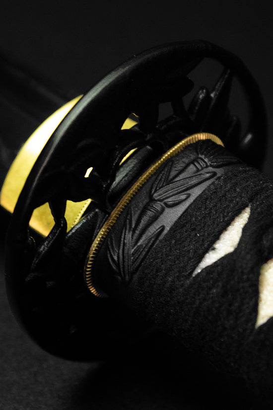 Close-up of samurai sword hilt- Guild Arms.