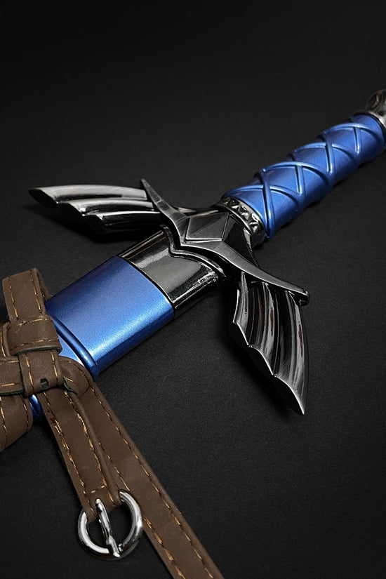 Blue sword handle with wing hilt and strap