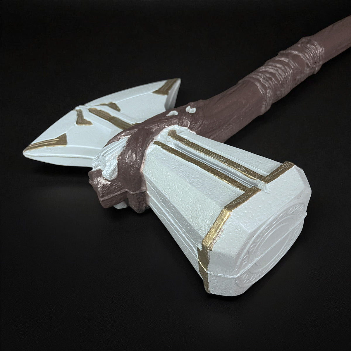 White and gold fantasy battle hammer