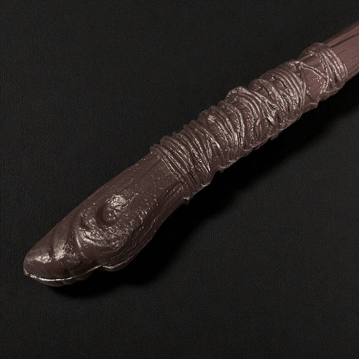 Close-up of fantasy weapon wrapped handle