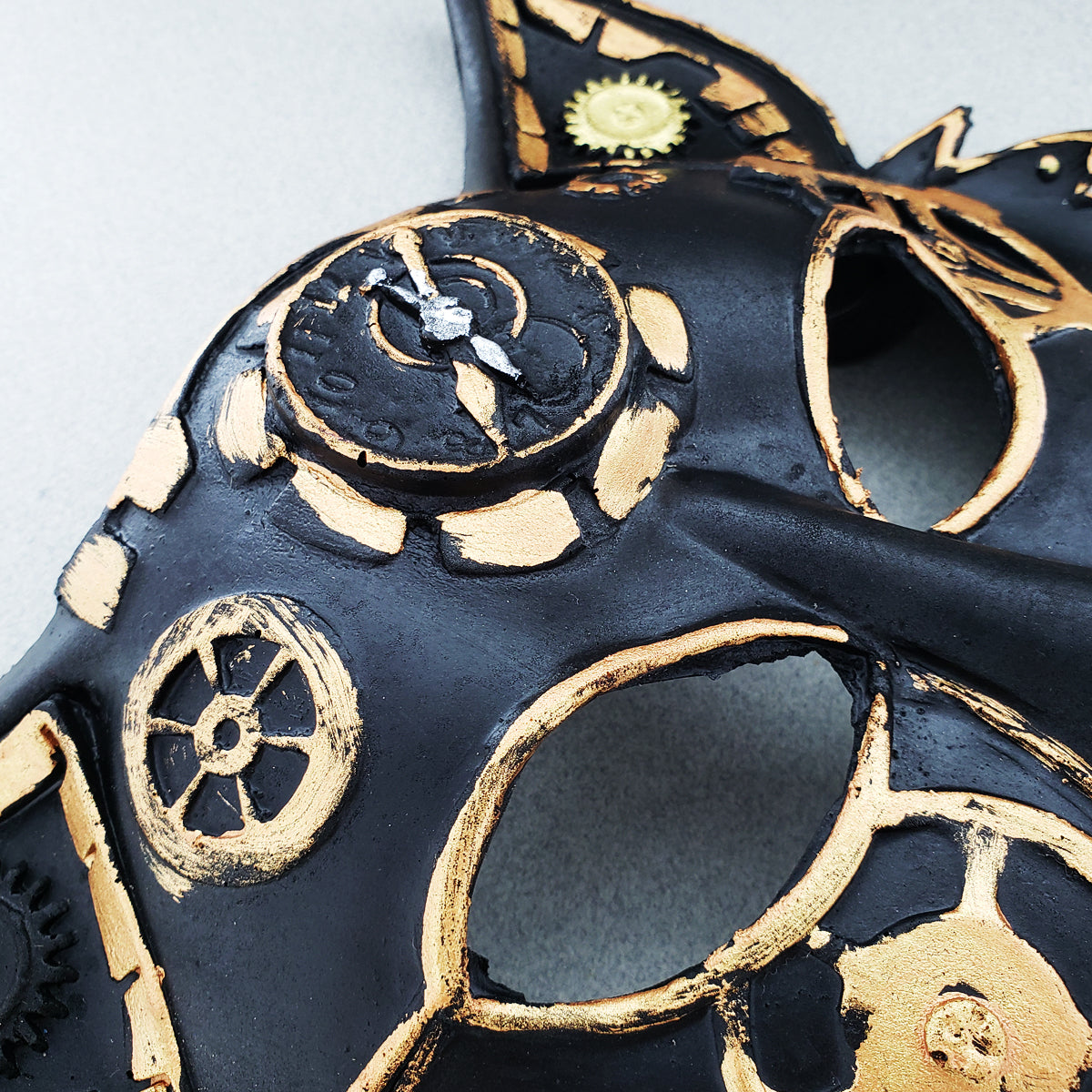 Close-up of steampunk wolf mask gears