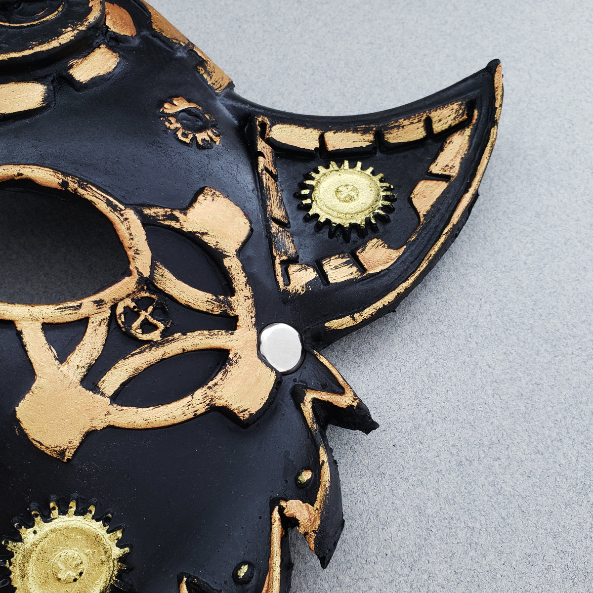Close-up of steampunk wolf mask ear