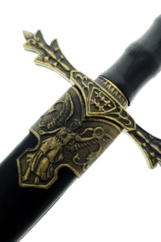 Close-up of dagger crossguard engraving
