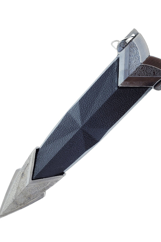 5 1/4" Dagger with hard plastic scabbard.