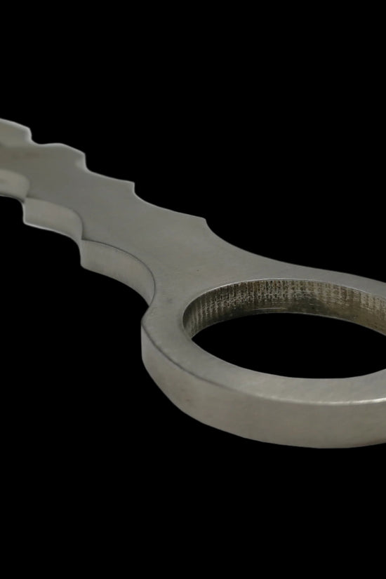 Falcon silver fixed blade tactical knife with ergonomic handle and finger ring for secure grip