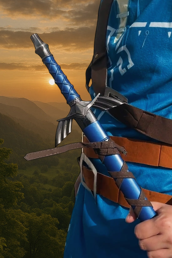 Cosplayer holding blue fantasy sword at sunset