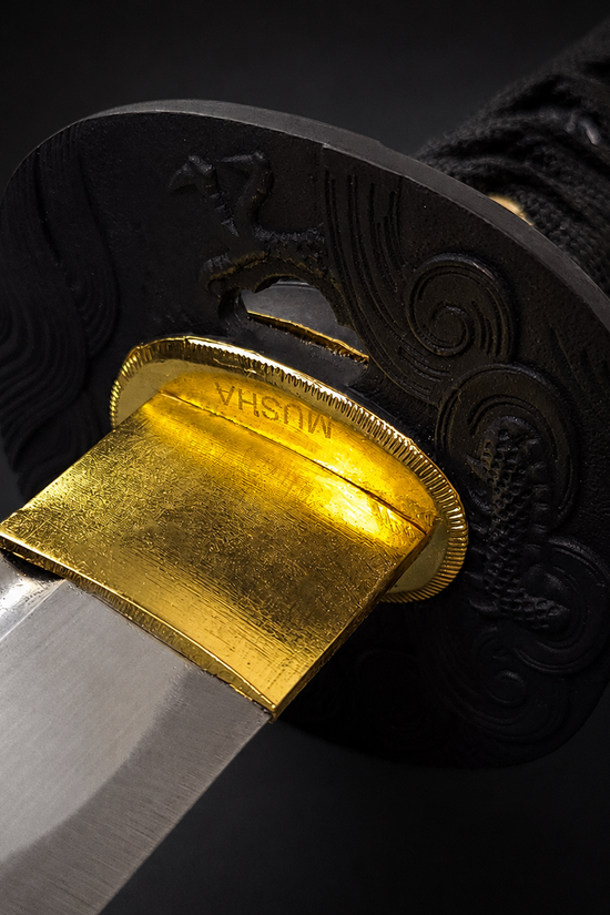 Musha katana close-up gold habaki collar.    | Guild Arms                              