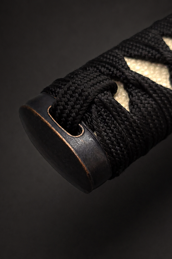 Samurai sword handle with black wrap. | Guild Arms