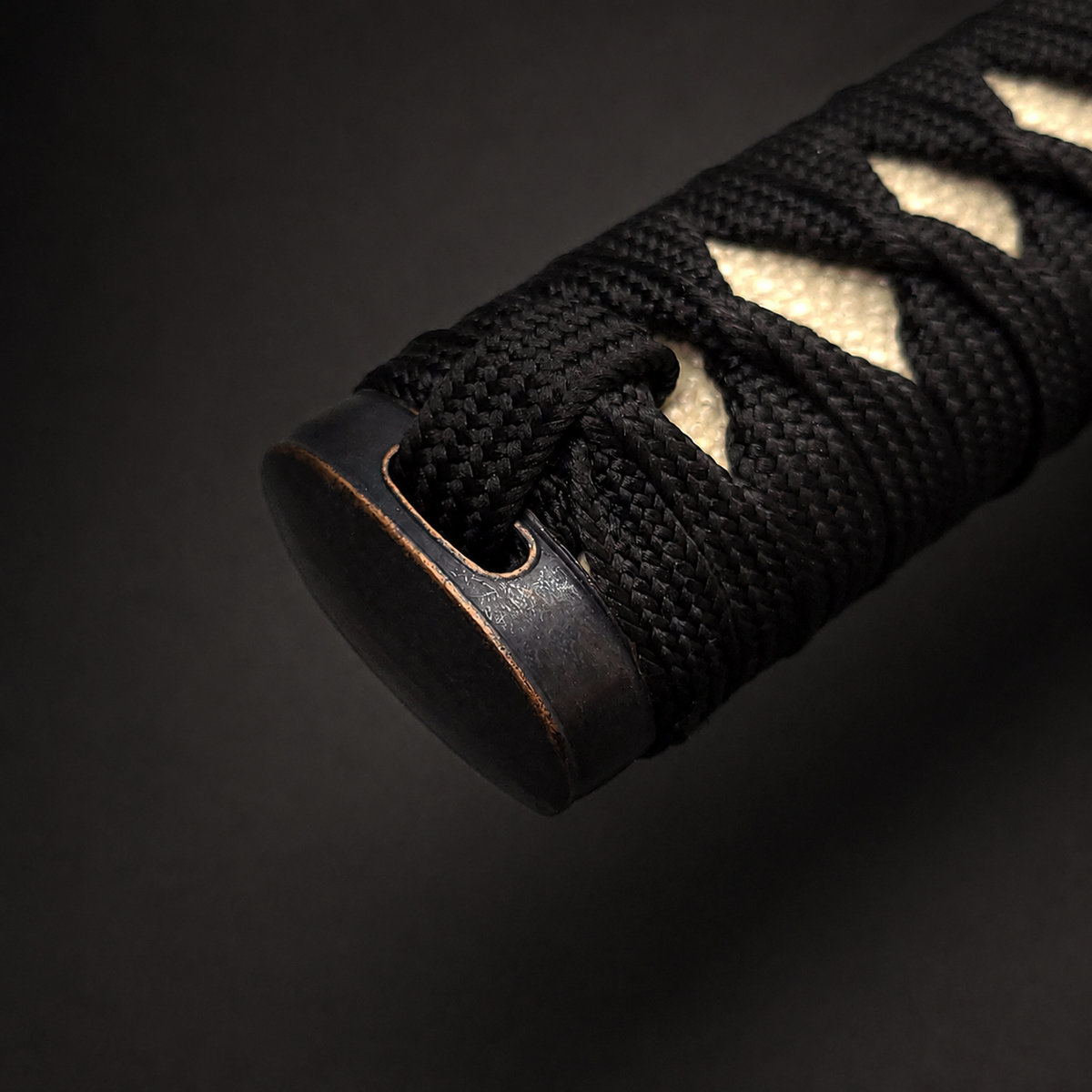 Samurai sword handle with black wrap. | Guild Arms