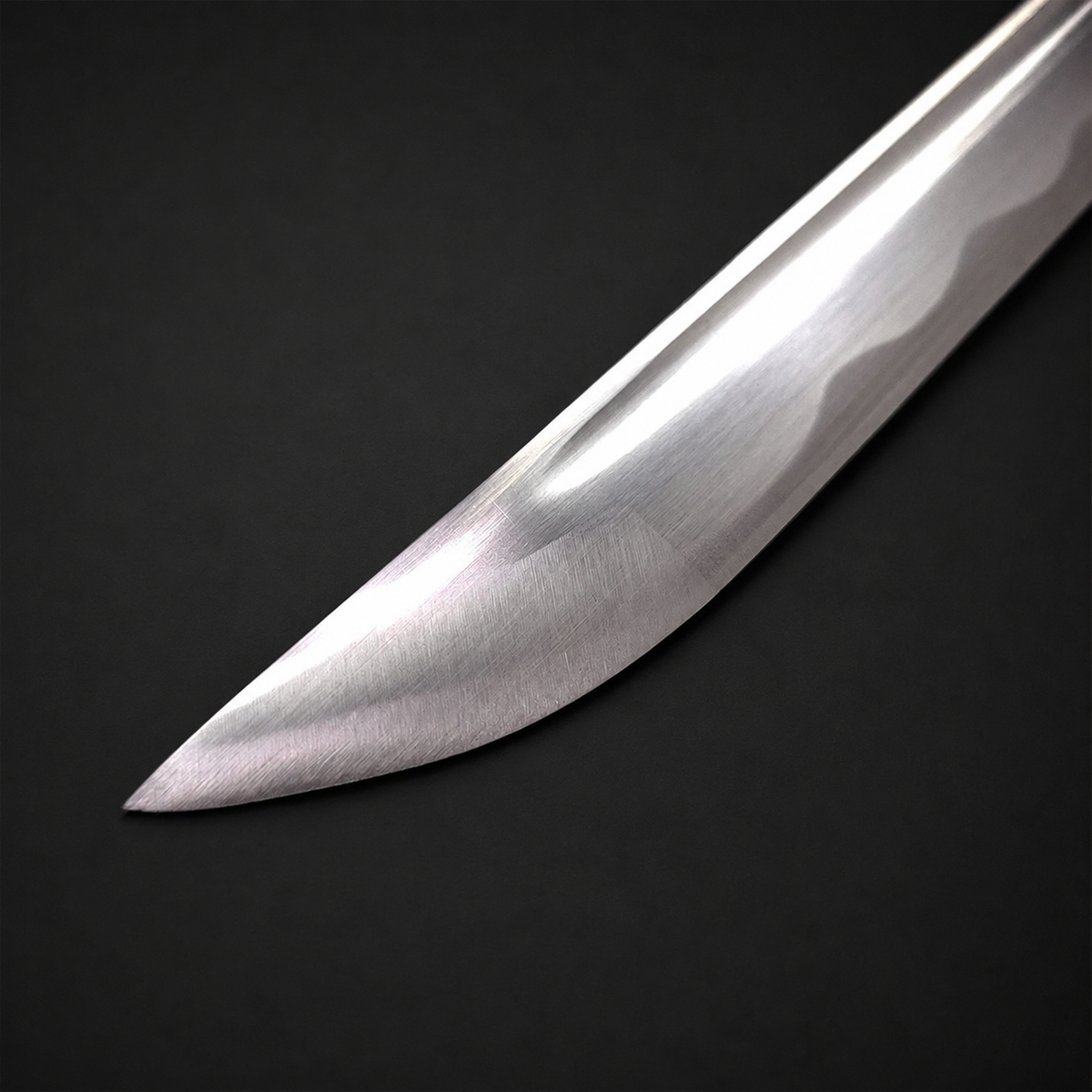 Polished tip of steel samurai sword. | Guild Arms