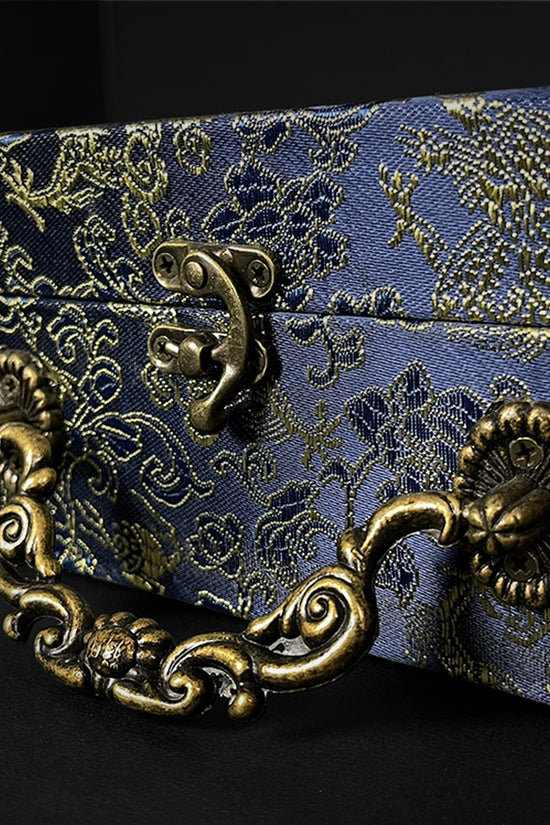 Ornate fabric-covered box- Guild Arms.