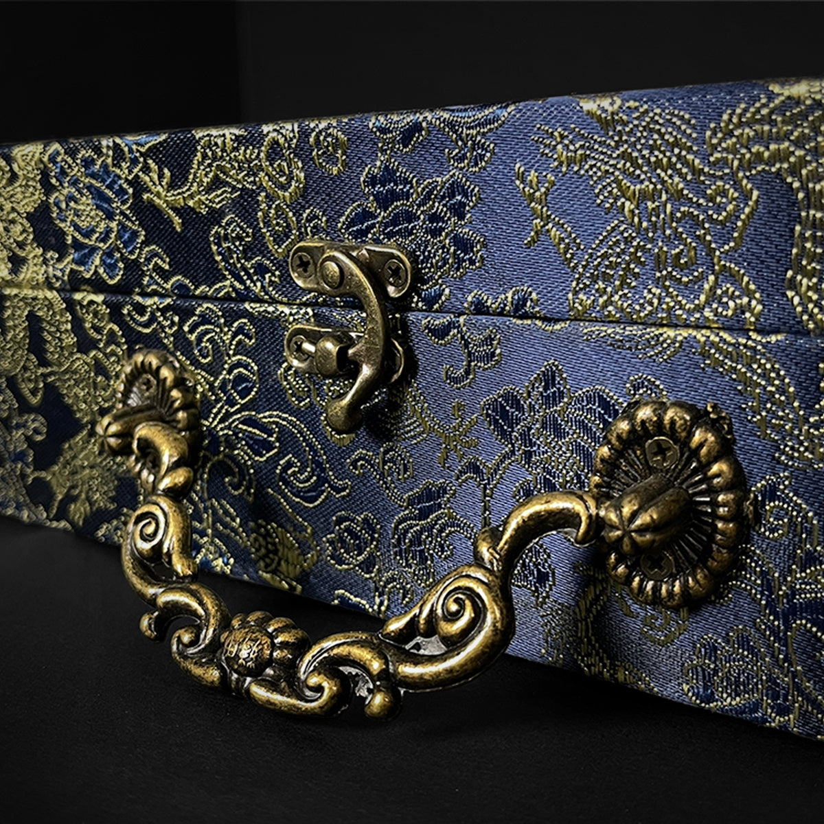 Ornate fabric-covered box- Guild Arms.