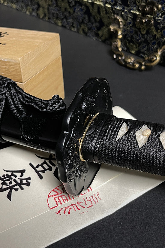 Black Japanese katana hilt closeup- Guild Arms.