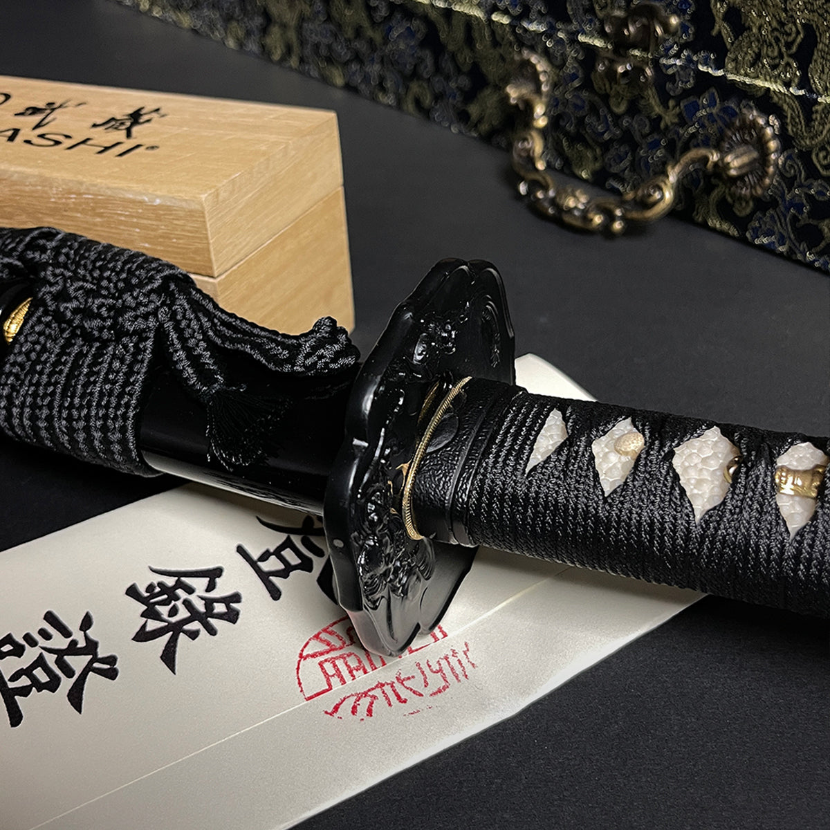 Black Japanese katana hilt closeup- Guild Arms.