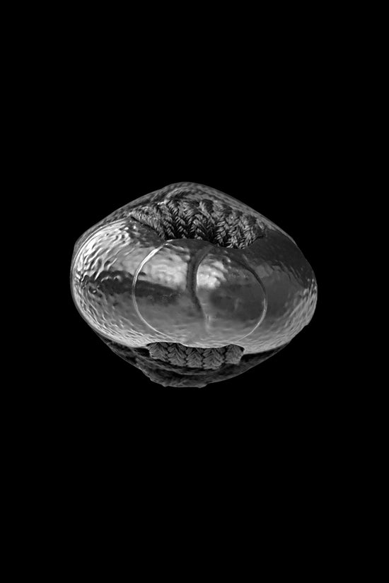 A single metallic round bead- Guild Arms.