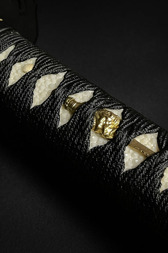 Japanese katana sword hilt closeup- Guild Arms.