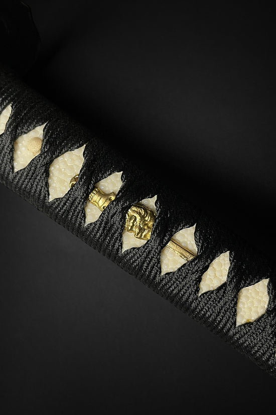 Japanese katana sword hilt closeup- Guild Arms.