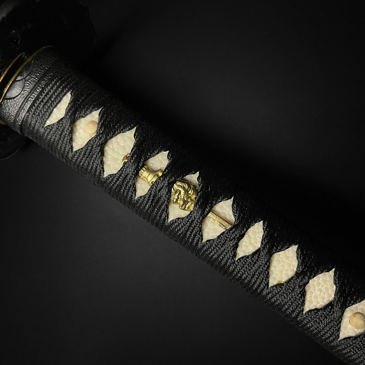 Japanese katana sword hilt closeup- Guild Arms.