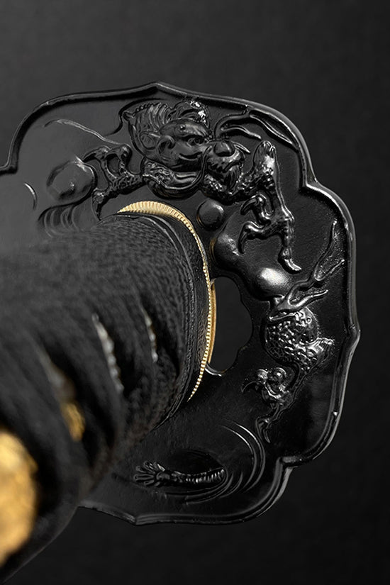 Ornate black katana tsuba- Guild Arms.