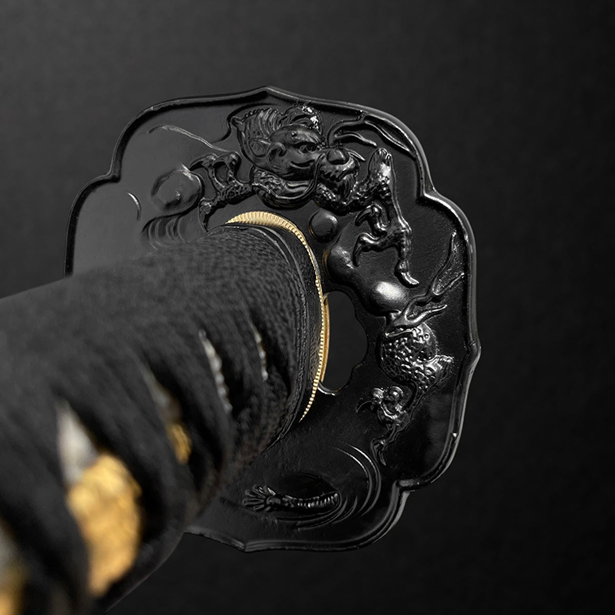 Ornate black katana tsuba- Guild Arms.