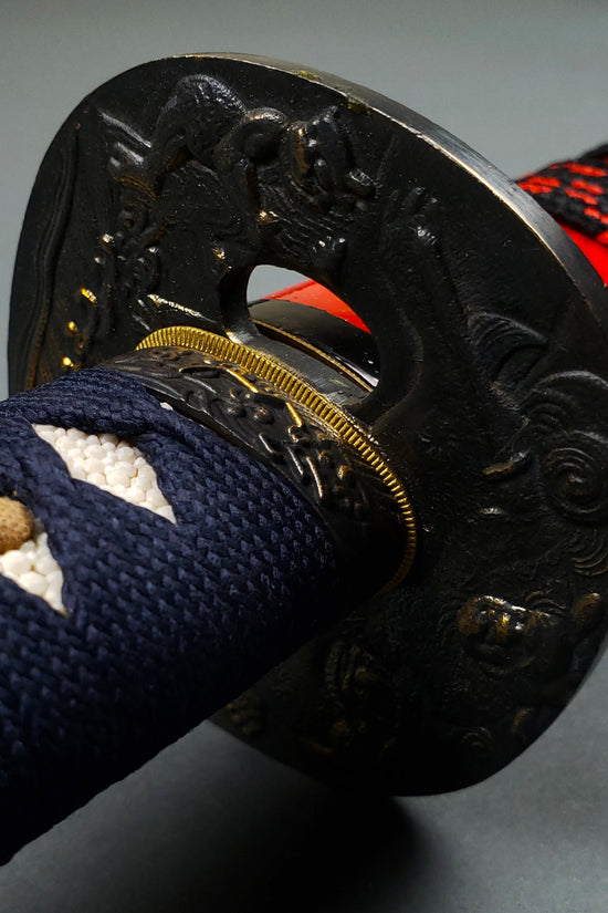 Close-up of Japanese katana tsuba- Guild Arms.