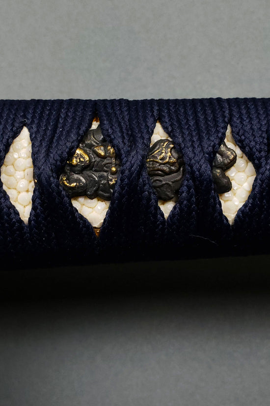 Katana hilt wrapping closeup- Guild Arms.