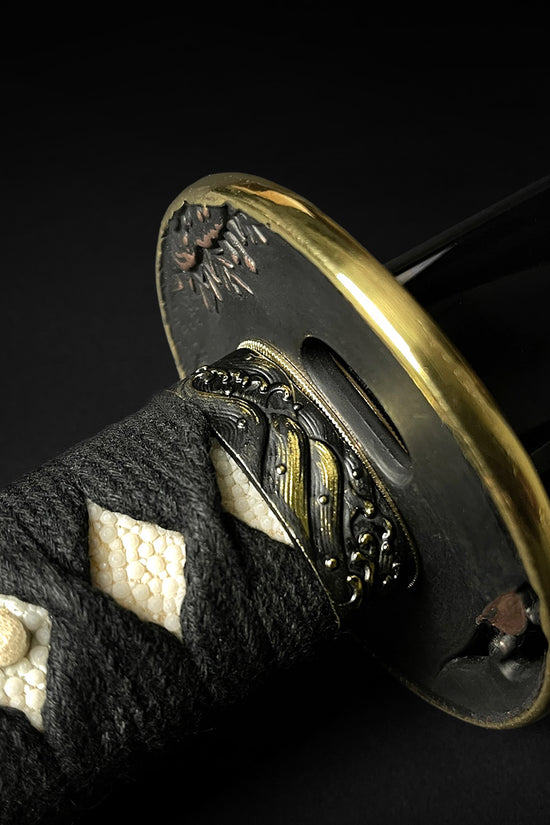 Close up of a katana hilt - Guild Arms.