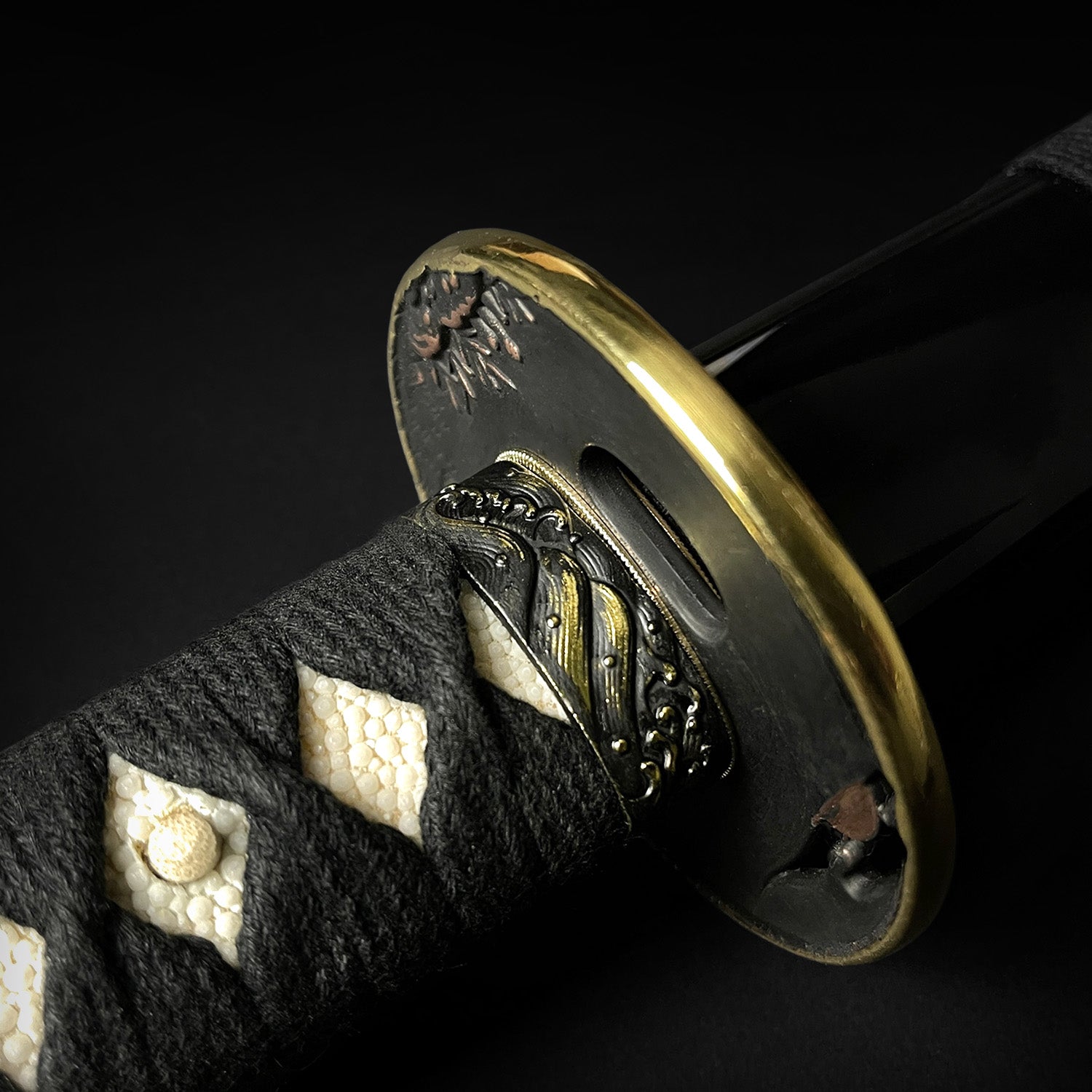 Close up of a katana hilt - Guild Arms.